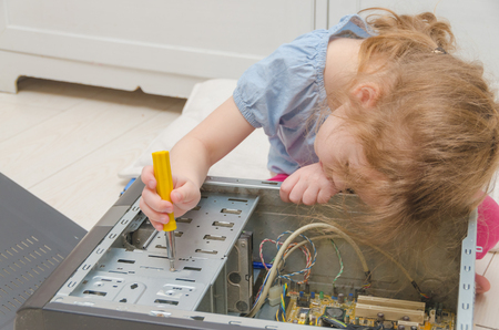 baby girl, baby computer repair, system block screwdriverの写真素材