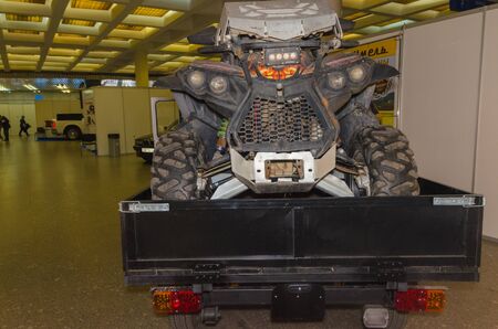Russia, St. Petersburg, April 13, 2018-ATV in the back of the tricycle bumblebee, the world...