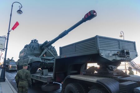 Russia, St. Petersburg, may 6, 2018-loading armored vehicles and tanks on tractors and trucks for transportation, on the Palace embankment.のeditorial素材