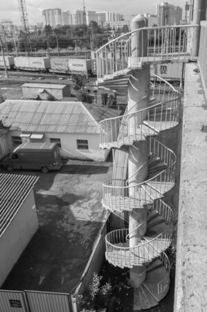 Russia, St. Petersburg September 16, 2017-spiral staircase to the railway bridge over the railsのeditorial素材
