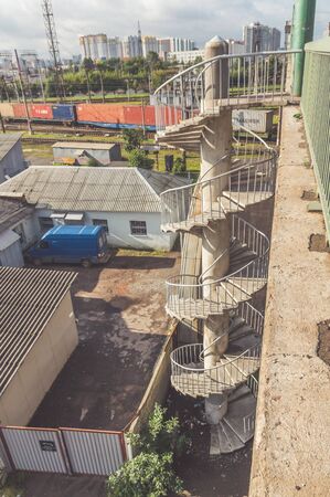 Russia, St. Petersburg September 16, 2017-spiral staircase to the railway bridge over the railsのeditorial素材