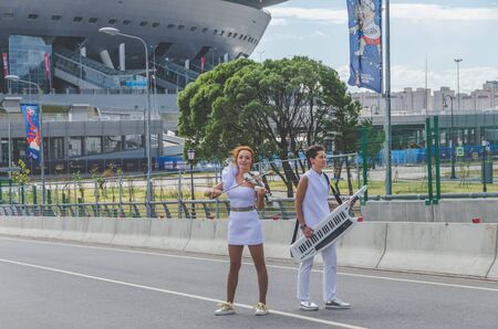 Russia, St. Petersburg, June 20, 2018 - two girls street musicians with violin and synthesizerのeditorial素材