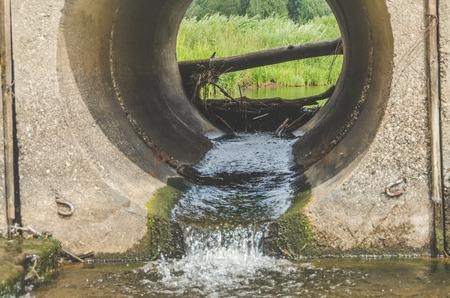 concrete pipe with waste water, stormの写真素材
