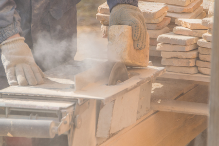 Working on the machine cuts the stone, laser diskの写真素材