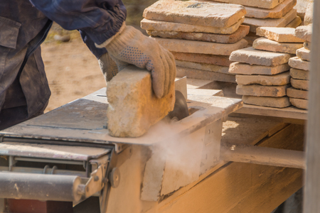 Working on the machine cuts the stone, laser diskの写真素材