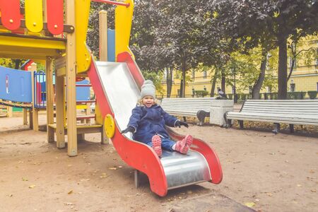 the family baby dad mom Playground play autumnの写真素材