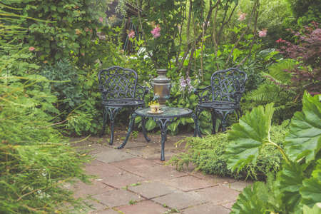 the garden there is furniture for relaxing and meetingの写真素材