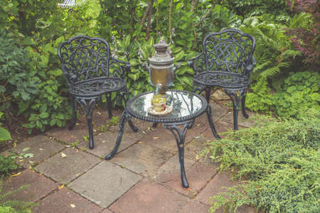 the garden there is furniture for relaxing and meeting