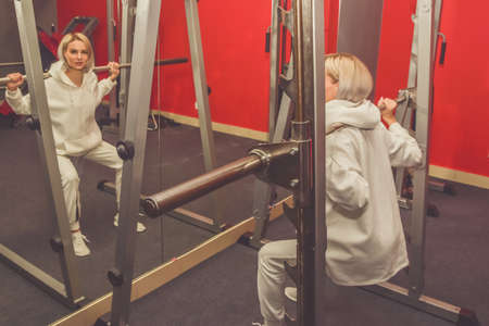 the girl on the gyms loses weight in the gym