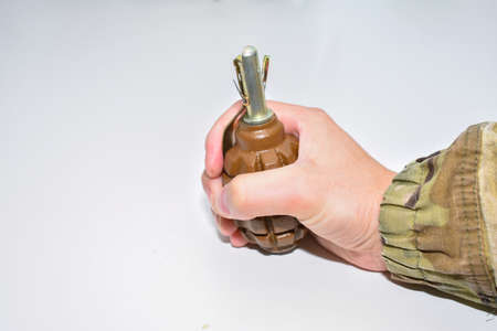 a hand grenade on a white background close-upの写真素材