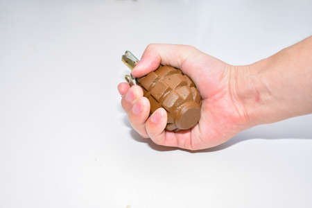 a hand grenade on a white background close-upの写真素材