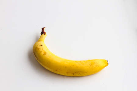 Banana isolated on white background. One banana on a white background.の写真素材