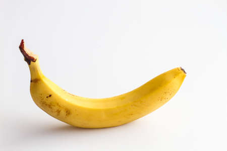 Banana isolated on white background. One banana on a white background.の写真素材