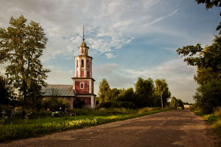 Shadows at dawn from the churchの写真素材