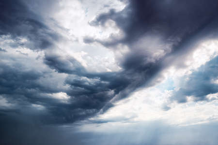 Background Dramatic dark sky with sun rays
