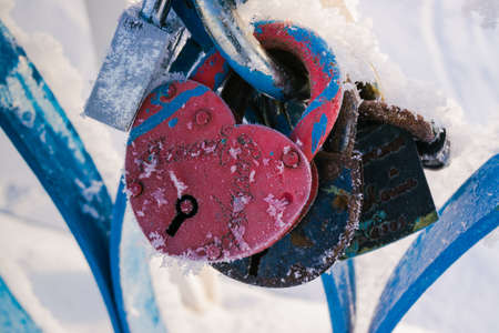 Marriage lock in winter bridgeの写真素材