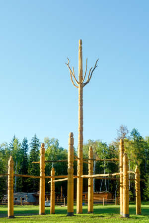 The religion of the Northern peoples of Yakutia - a symbol of the tree of life Al Luuk Mas stands wooden in the Park in the North of Russia in the forest in the Park in the village of ulus Suntar.のeditorial素材