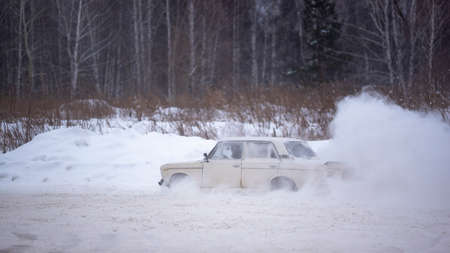 Russia, Novosibirsk - November 30, 2019.  Russian modified car VAZ-Zhiguli goes fast drift turning...