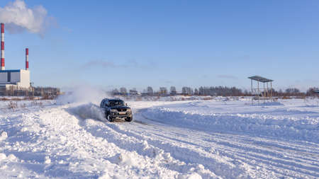 Russia, Novosibirsk-January 20, 2020 4x4 all-wheel drive modified SUV "Mitsubishi Pajero sport" quickly goes raising snow bumper in winter on the road.のeditorial素材