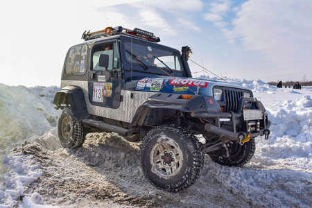 Russia, Novosibirsk-March 23, 2020. Offroad SUV Jeep Wrangler 4x4 with off-road training rides in...