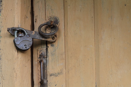 Antique door lock, wooden door, old objectの写真素材