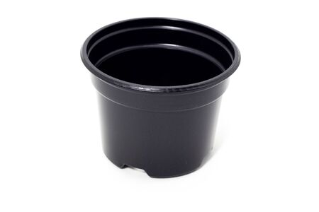 plastic black flowerpots on white backgroundの写真素材