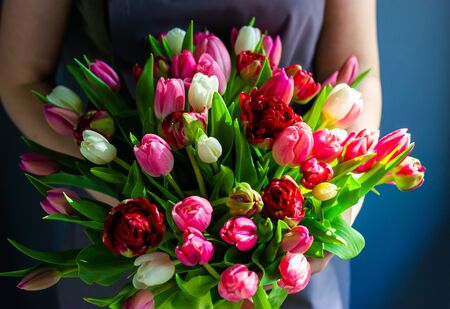 girl florist holding a bouquetの写真素材