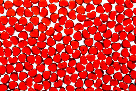 Red glass heart on a white background