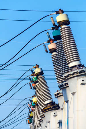 High voltage electric power substation in winter dayの写真素材