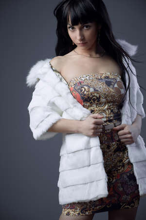 Portrait of sexy brunette woman wear furの写真素材
