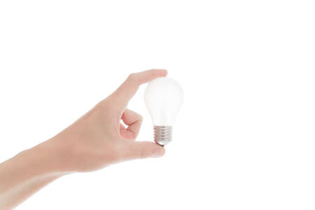 Lightbulb in a hand isolated on white backgroundの写真素材