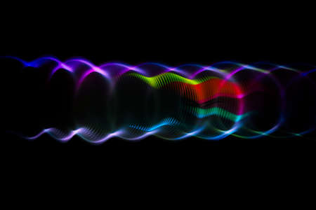 Sound waves in the visible blue color in the darkの写真素材