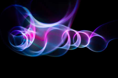 Sound waves in the visible blue color in the darkの写真素材