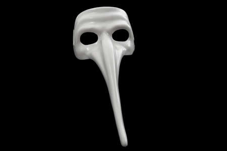Mask with long nose is isolated on blackの写真素材