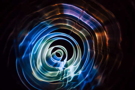 Sound waves in the dark in full colorの写真素材