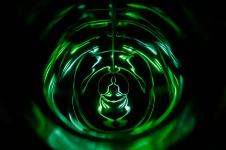 Yoga meditation in lotus pose with aura spiritualの写真素材