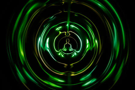 Yoga meditation in lotus pose with aura spiritualの写真素材