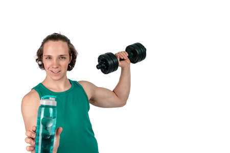 Handsome young man lifting dumbbell. White backgroundの写真素材