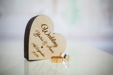 Gold wedding rings for newlyweds on wedding day