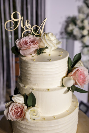 Beautiful tiered delicious dessert sweet cake for newlyweds.の写真素材