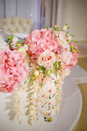 Wedding table decor for newlyweds decorations with fresh flowersの写真素材