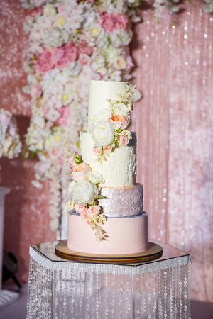 Delicious sweet layered fresh cake for the holiday with beautiful decorationsの写真素材