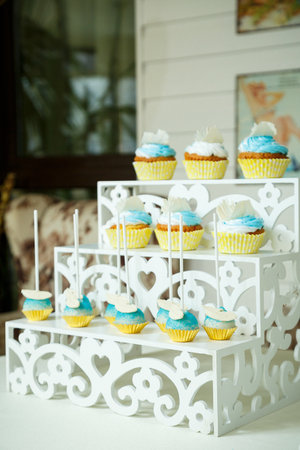 Sweet beautiful cake and other sweets for a child's birthdayの写真素材