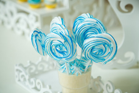 Sweet beautiful cake and other sweets for a child's birthdayの写真素材