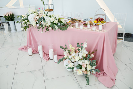 Wedding table decor for newlyweds decorations with fresh flowersの写真素材