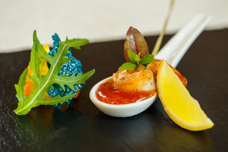 Delicious food in the restaurant on a plateの写真素材