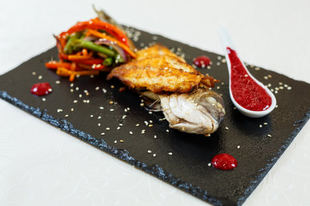 Delicious food in the restaurant on a plateの写真素材