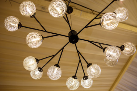Modern loft chandelier with many shades with energy saving lampsの写真素材