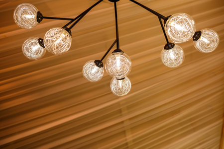 Modern loft chandelier with many shades with energy saving lampsの写真素材
