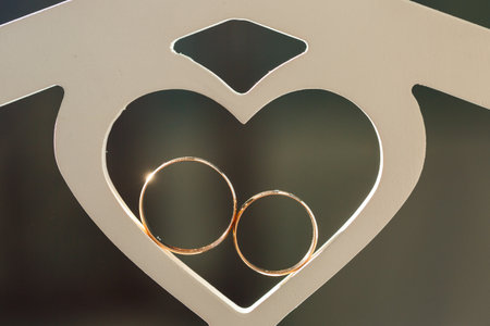 Golden wedding rings for newlyweds on their wedding dayの写真素材